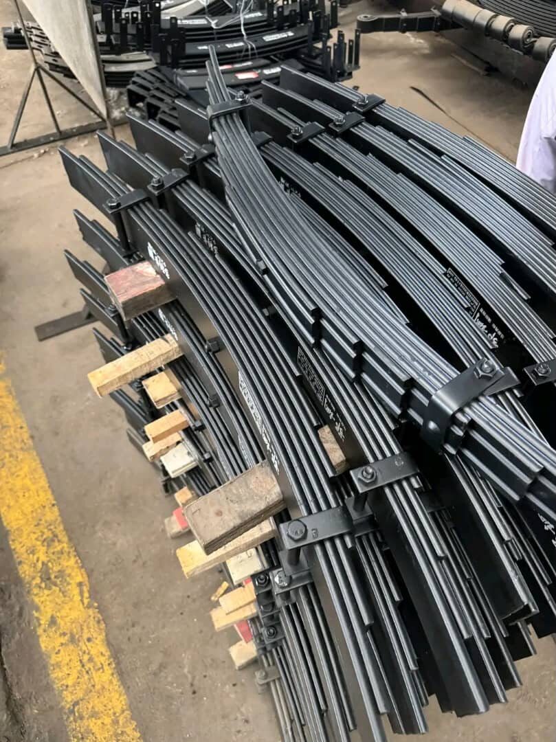 Batch of finished medium vehicle leaf spring packs ready for fleet delivery